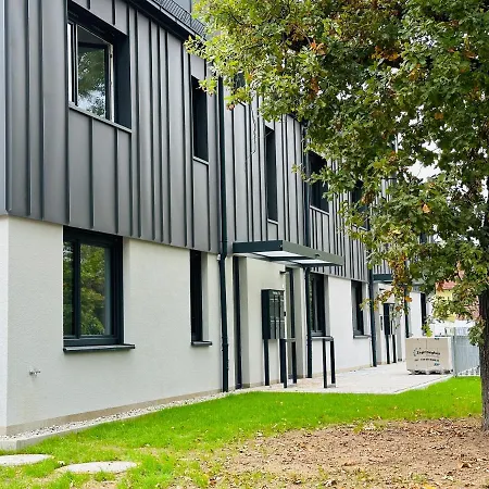 Ferienwohnung-parkplatz-balkon-kueche-smarttv-waschtrockner