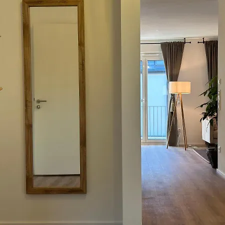 Ferienwohnung-parkplatz-balkon-kueche-aufzug-smarttv-waschtrockner