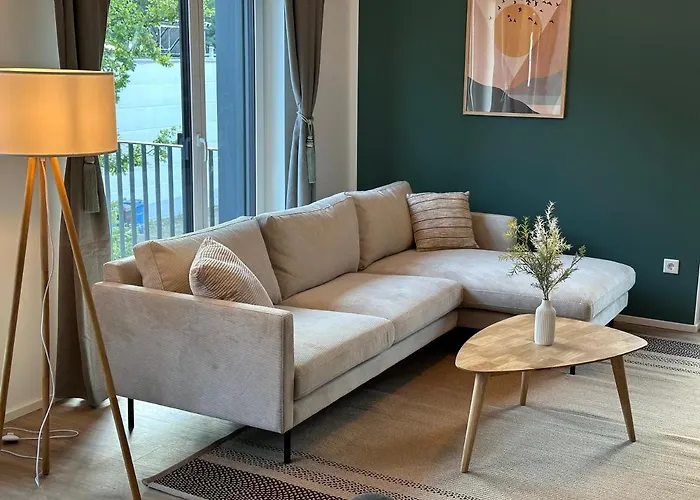 Апартаменты Ferienwohnung-parkplatz-balkon-kueche-smarttv-waschtrockner *