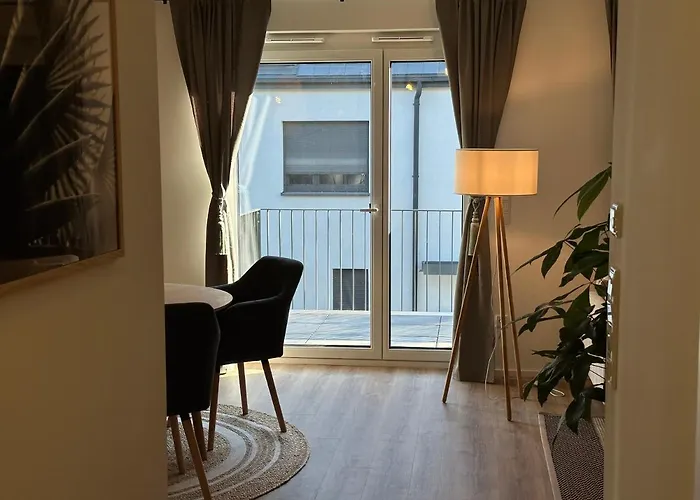 Апартаменты Ferienwohnung-parkplatz-balkon-kueche-smarttv-waschtrockner