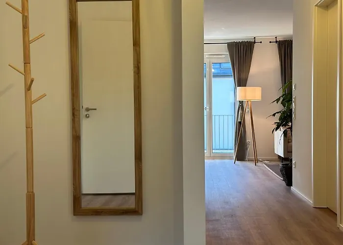 Ferienwohnung-parkplatz-balkon-küche-aufzug-smarttv-waschtrockner
